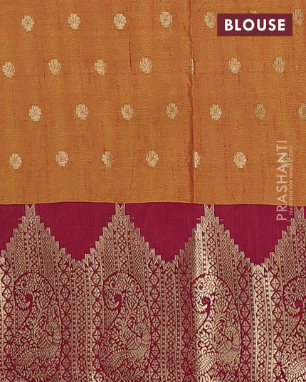 Semi raw silk saree dual shade of dark mustard and wine shade with allover floral butta prints & 1000 zari buttas and zari woven border