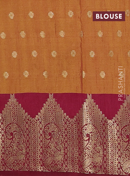 Semi raw silk saree dual shade of dark mustard and wine shade with allover floral butta prints & 1000 zari buttas and zari woven border