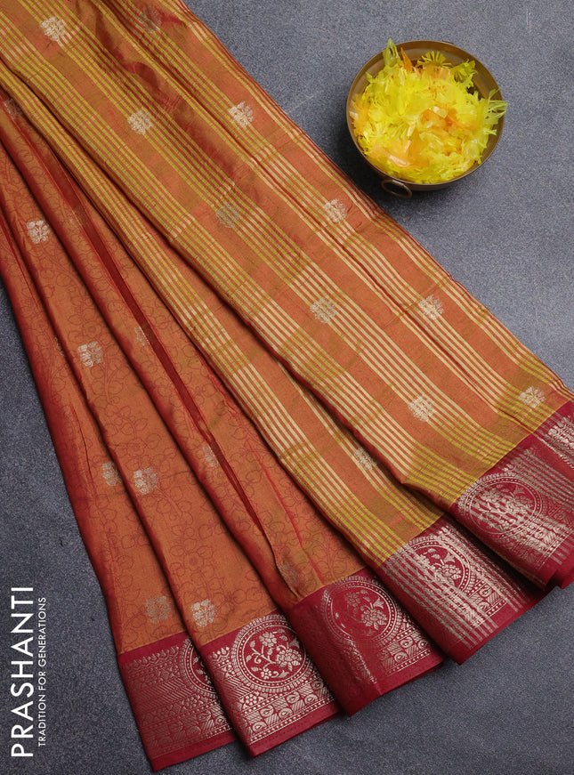 Semi raw silk saree dual shade of dark mustard and maroon with allover kalamkari prints & 1000 zari buttas and zari woven border