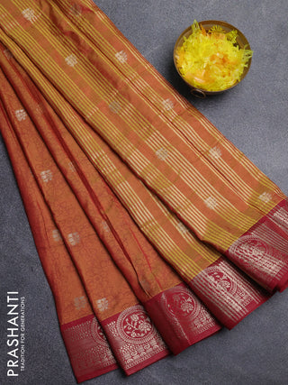 Semi raw silk saree dual shade of dark mustard and maroon with allover kalamkari prints & 1000 zari buttas and zari woven border
