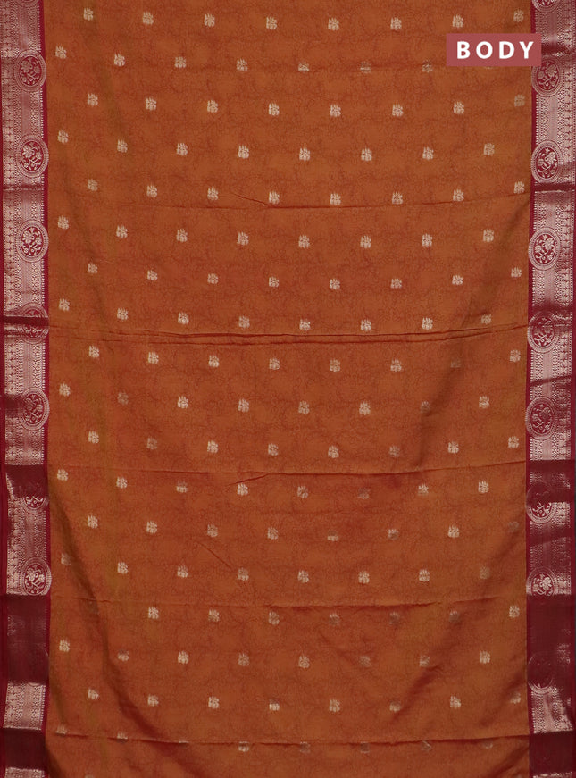 Semi raw silk saree dual shade of dark mustard and maroon with allover kalamkari prints & 1000 zari buttas and zari woven border