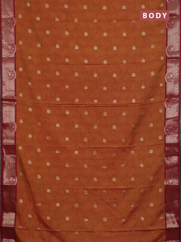 Semi raw silk saree dual shade of dark mustard and maroon with allover kalamkari prints & 1000 zari buttas and zari woven border