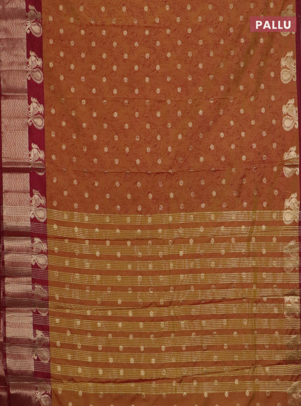 Semi raw silk saree dark mustard and maroon with allover prints & 1000 zari buttas and zari woven border