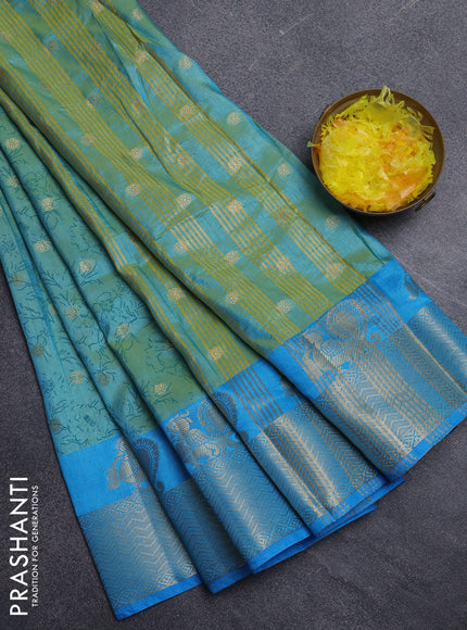 Semi raw silk saree dual shade of teal bluish green and cs blue with allover prints & 1000 zari buttas and zari woven border