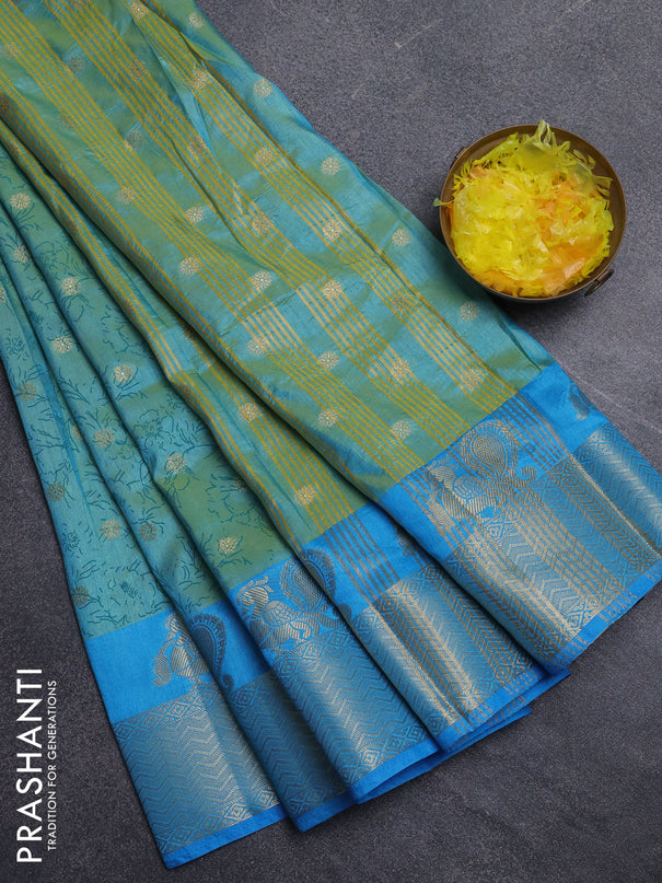 Semi raw silk saree dual shade of teal bluish green and cs blue with allover prints & 1000 zari buttas and zari woven border