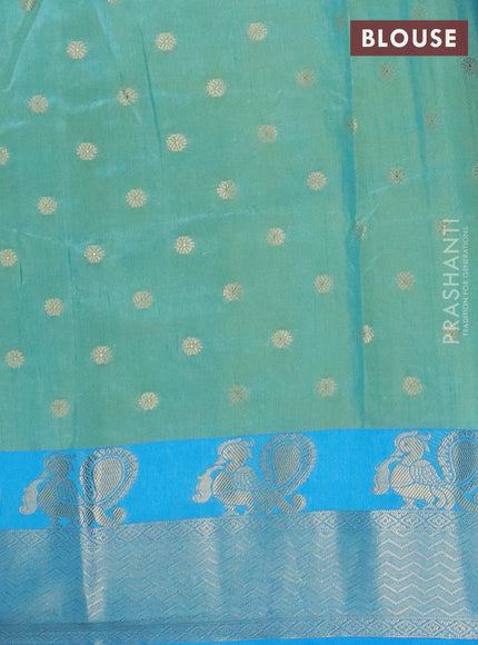 Semi raw silk saree dual shade of teal bluish green and cs blue with allover prints & 1000 zari buttas and zari woven border