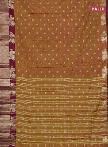 Semi raw silk saree dual shade of mustard green and wine shade with allover prints & 1000 zari buttas and zari woven border