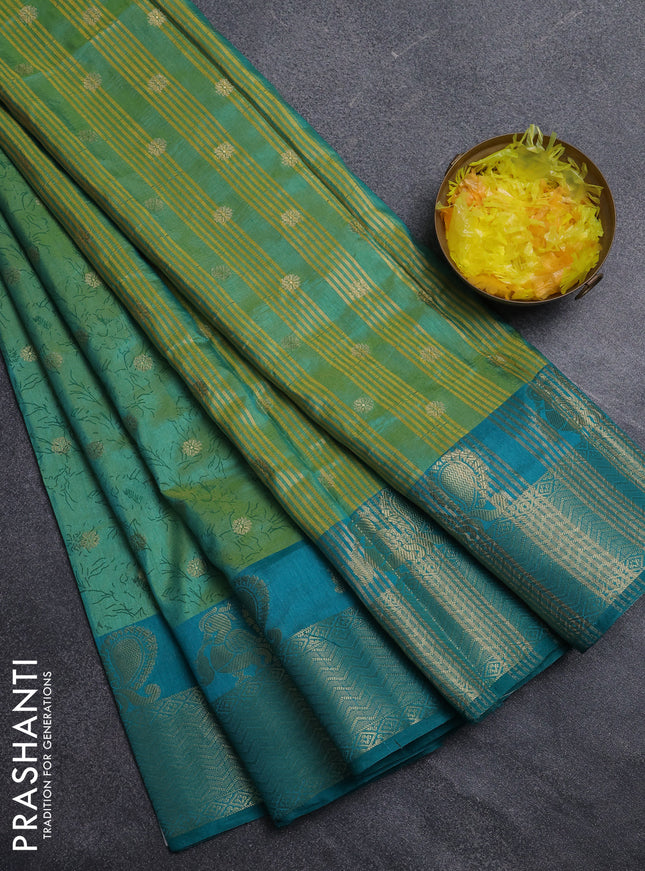 Semi raw silk saree dual shade of teal bluish green and teal green with allover prints & 1000 zari buttas and zari woven border
