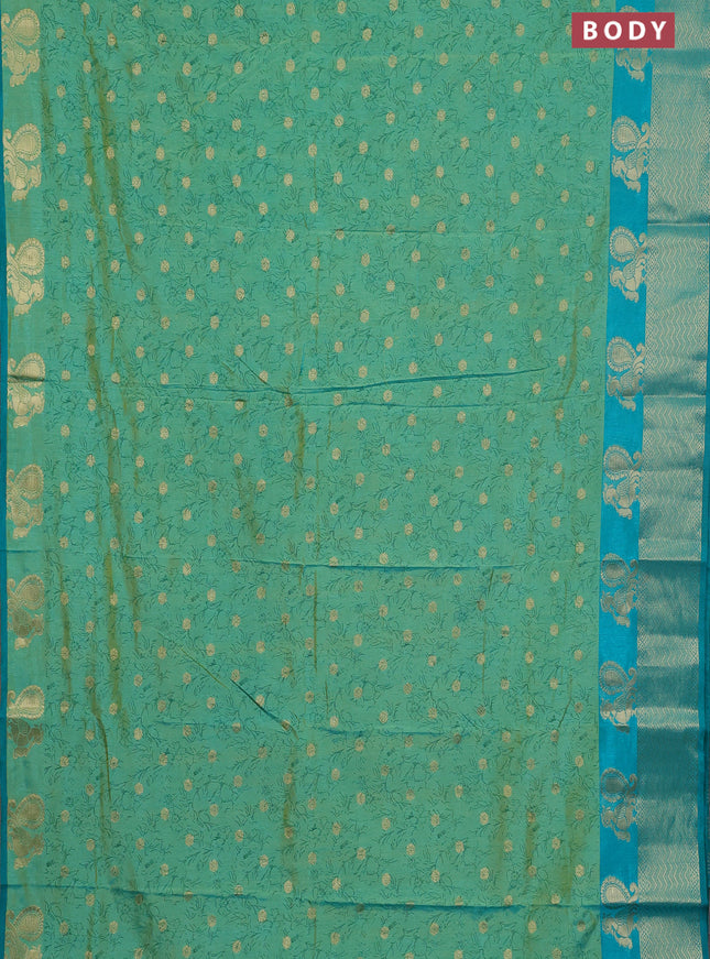 Semi raw silk saree dual shade of teal bluish green and teal green with allover prints & 1000 zari buttas and zari woven border
