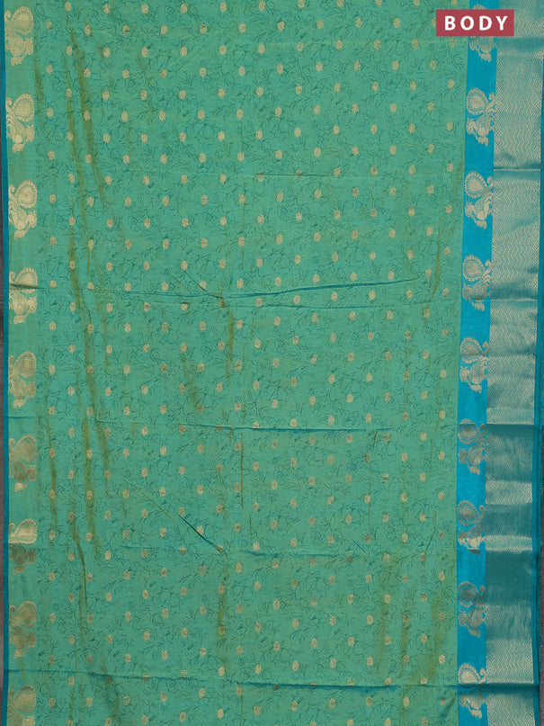 Semi raw silk saree dual shade of teal bluish green and teal green with allover prints & 1000 zari buttas and zari woven border
