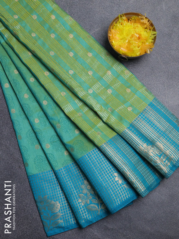 Semi raw silk saree dual shade of teal bluish green and teal blue with allover floral butta prints & 1000 zari buttas and long zari woven border