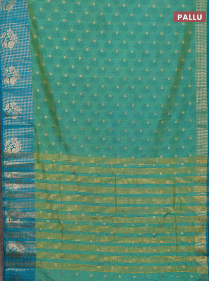 Semi raw silk saree dual shade of teal bluish green and teal blue with allover floral butta prints & 1000 zari buttas and long zari woven border