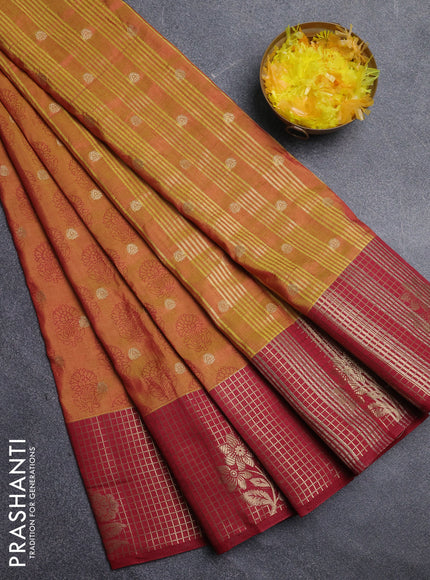 Semi raw silk saree dark mustard and maroon with allover floral butta prints & 1000 zari buttas and long zari woven border