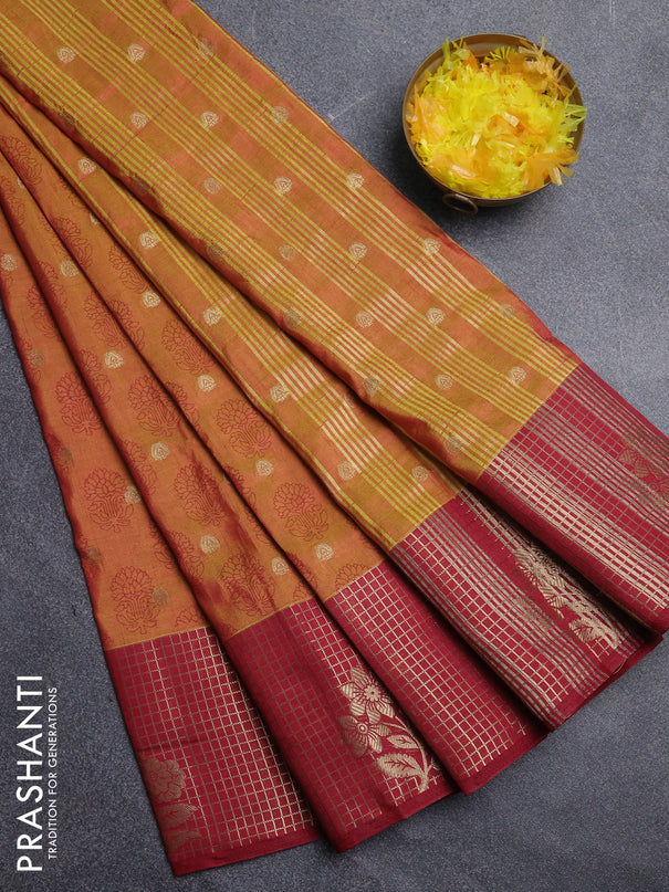 Semi raw silk saree dark mustard and maroon with allover floral butta prints & 1000 zari buttas and long zari woven border