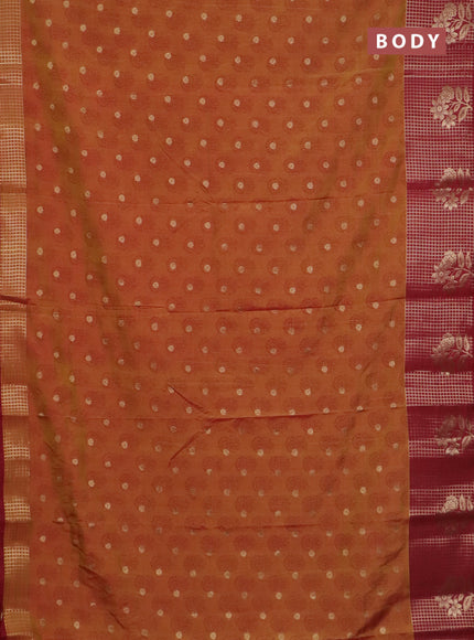 Semi raw silk saree dark mustard and maroon with allover floral butta prints & 1000 zari buttas and long zari woven border