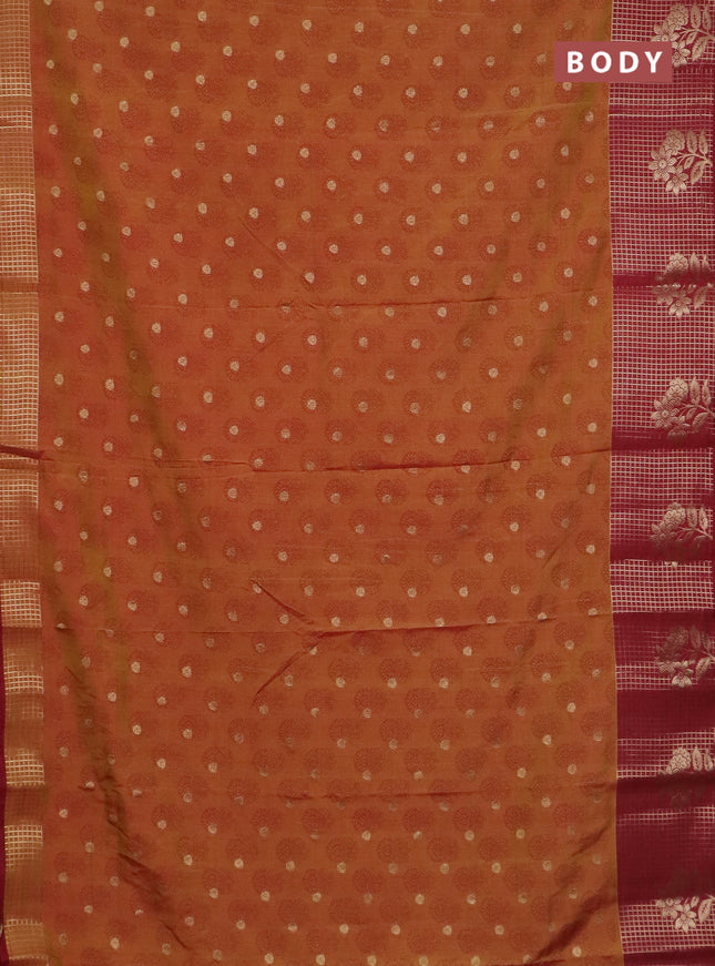 Semi raw silk saree dark mustard and maroon with allover floral butta prints & 1000 zari buttas and long zari woven border
