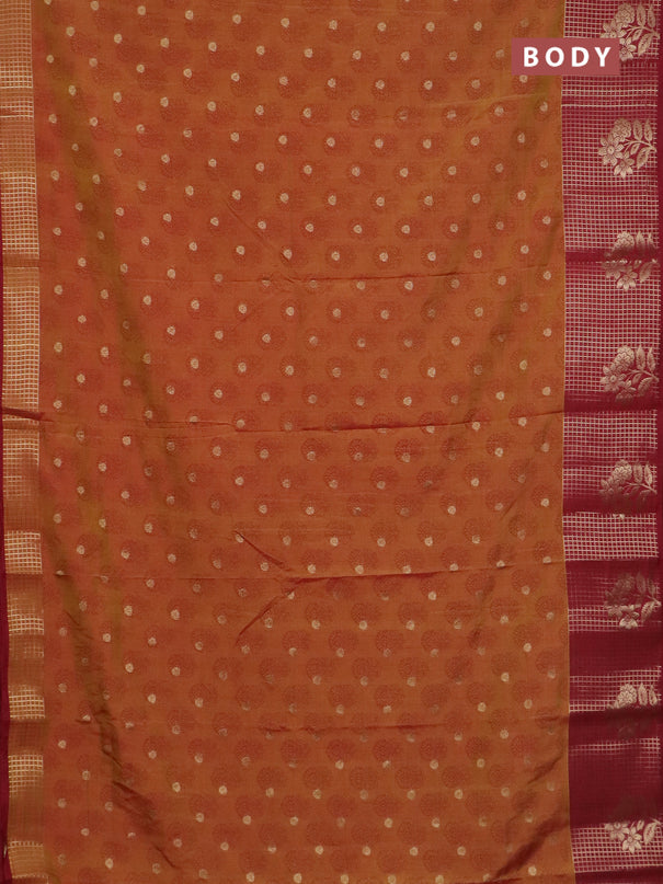 Semi raw silk saree dark mustard and maroon with allover floral butta prints & 1000 zari buttas and long zari woven border