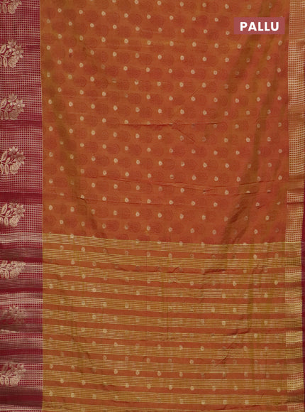 Semi raw silk saree dark mustard and maroon with allover floral butta prints & 1000 zari buttas and long zari woven border