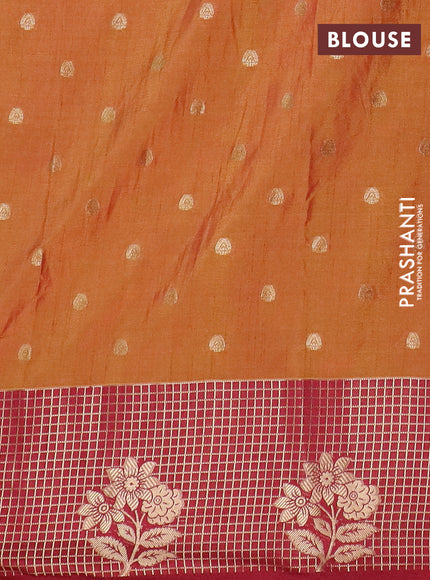 Semi raw silk saree dark mustard and maroon with allover floral butta prints & 1000 zari buttas and long zari woven border
