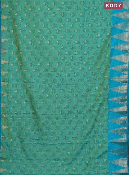 Semi raw silk saree dual shade of teal blue and cs blue with allover floral butta prints & 1000 zari buttas and temple design zari woven border