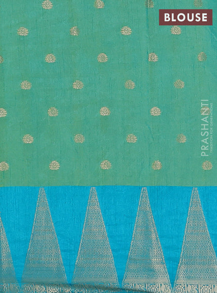 Semi raw silk saree dual shade of teal blue and cs blue with allover floral butta prints & 1000 zari buttas and temple design zari woven border