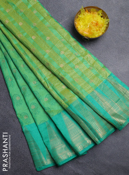 Semi raw silk saree light green and teal green with allover floral butta prints & 1000 zari buttas and temple design zari woven border