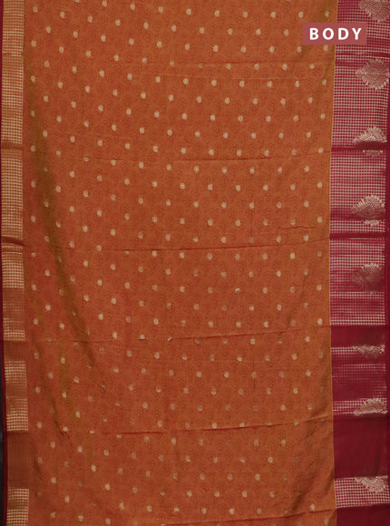 Semi raw silk saree dual shade of dark mustard and maroon with allover floral prints & 1000 zari buttas and long zari woven border