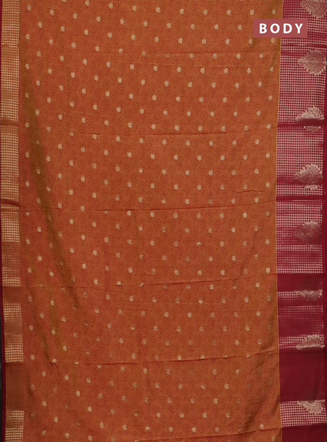 Semi raw silk saree dual shade of dark mustard and maroon with allover floral prints & 1000 zari buttas and long zari woven border
