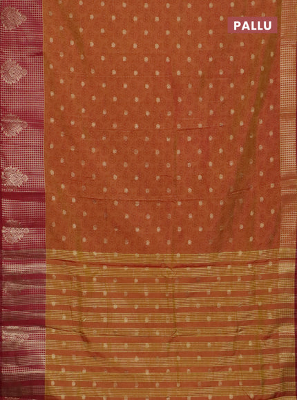Semi raw silk saree dual shade of dark mustard and maroon with allover floral prints & 1000 zari buttas and long zari woven border