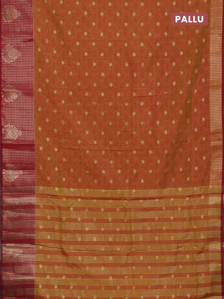 Semi raw silk saree dual shade of dark mustard and maroon with allover floral prints & 1000 zari buttas and long zari woven border