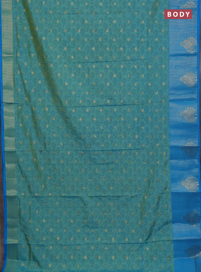 Semi raw silk saree dual shade of teal bluish green and cs blue with allover floral prints & 1000 zari buttas and long zari woven border