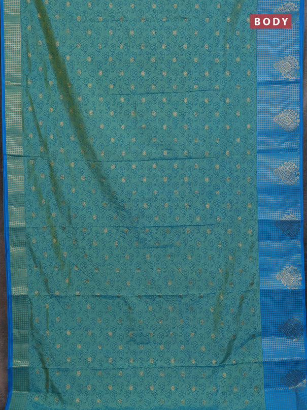 Semi raw silk saree dual shade of teal bluish green and cs blue with allover floral prints & 1000 zari buttas and long zari woven border