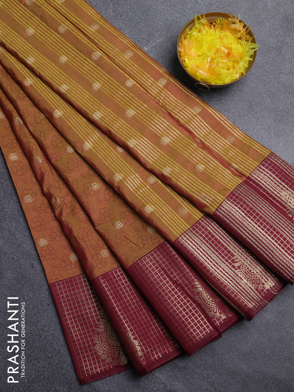 Semi raw silk saree dark mustard green and wine shade with allover floral prints & 1000 zari buttas and long zari woven border
