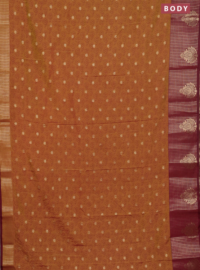 Semi raw silk saree dark mustard green and wine shade with allover floral prints & 1000 zari buttas and long zari woven border