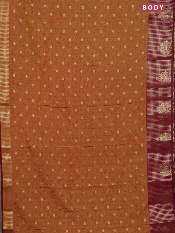 Semi raw silk saree dark mustard green and wine shade with allover floral prints & 1000 zari buttas and long zari woven border