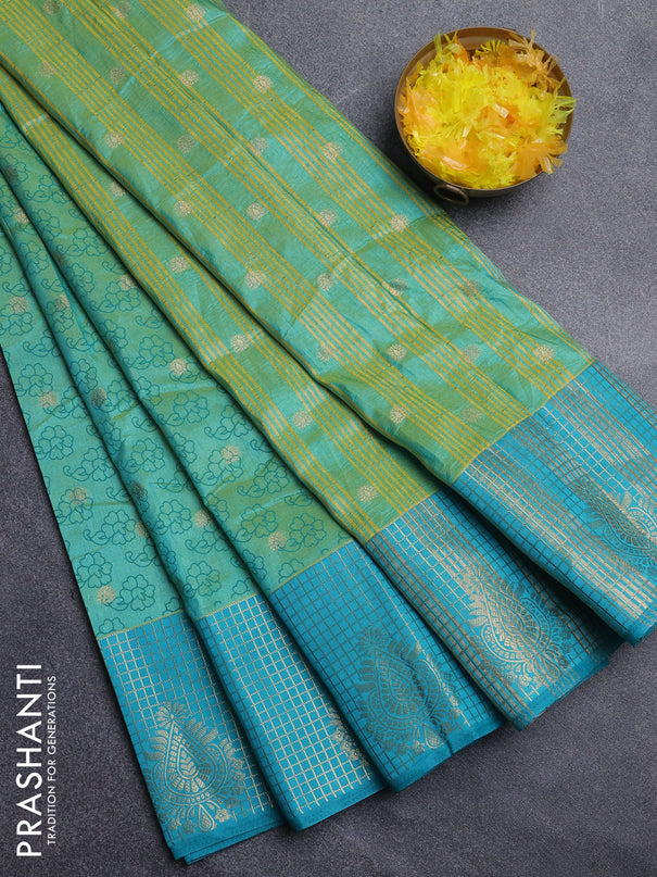 Semi raw silk saree dual shade of teal bluish green and teal blue with allover floral prints & 1000 zari buttas and long zari woven border