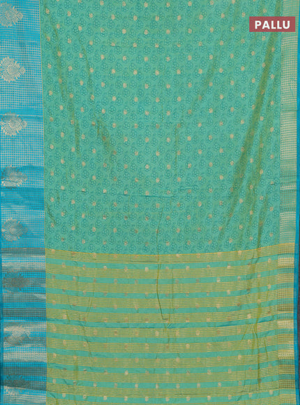Semi raw silk saree dual shade of teal bluish green and teal blue with allover floral prints & 1000 zari buttas and long zari woven border