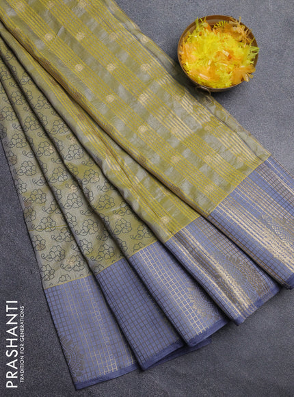 Semi raw silk saree elaichi green and grey with allover floral prints & 1000 zari buttas and long zari woven border
