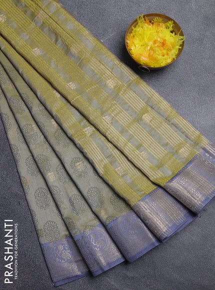 Semi raw silk saree elaichi green and grey with allover butta prints & 1000 zari buttas and zari woven border
