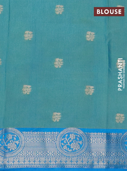 Semi raw silk saree dual shade of teal blue and cs blue with allover prints & 1000 zari buttas and zari woven border