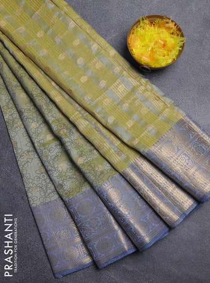 Semi raw silk saree elaichi green and grey with allover kalamkari prints & 1000 zari buttas and long zari woven border
