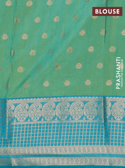 Semi raw silk saree dual shade of teal bluish green and teal blue with allover prints & 1000 zari buttas and long zari woven border