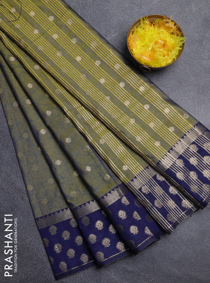 Semi raw silk saree mehendi green and navy blue with allover prints & 1000 zari buttas and long zari woven border