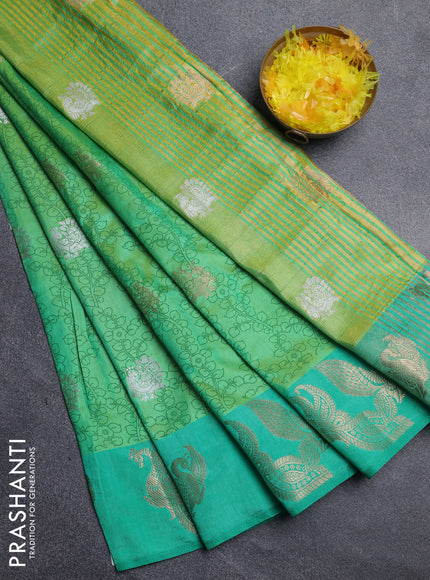 Semi raw silk saree light green and teal green with allover kalamkari prints & 1000 zari buttas and zari woven peacock butta border