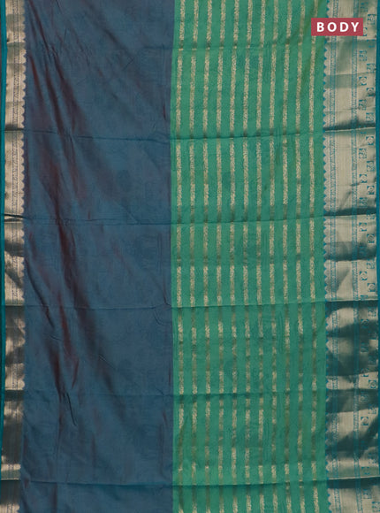 Semi raw silk saree dual shade of teal bluish red and teal greenish blue with allover half & half style and zari woven border