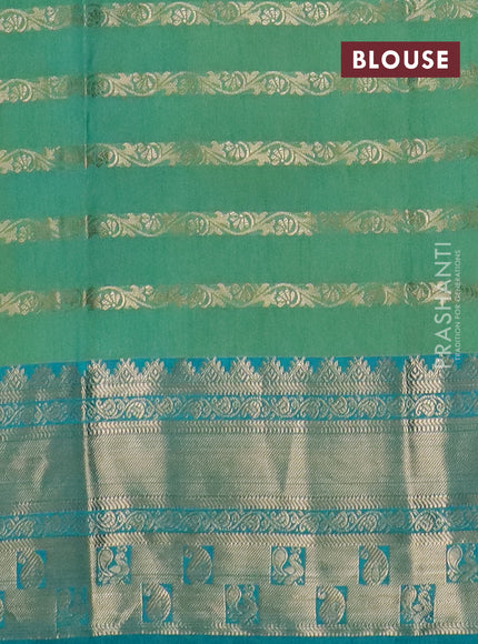 Semi raw silk saree dual shade of teal bluish red and teal greenish blue with allover half & half style and zari woven border