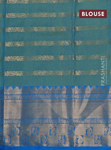 Semi raw silk saree dual shade of purple and dual shade of teal bluish green with allover half & half style and zari woven border