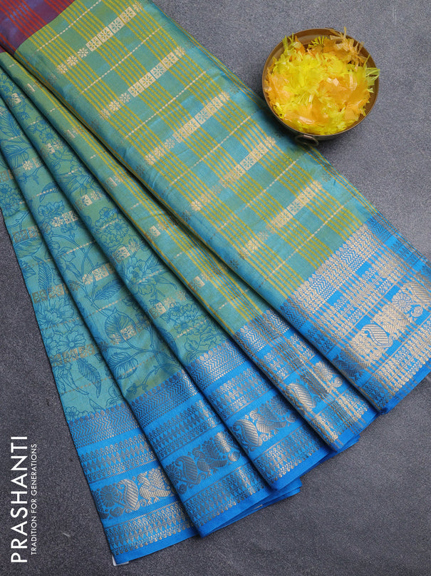 Semi raw silk saree dual shade of pastel maroon and teal bluish green with allover half & half style and zari woven border