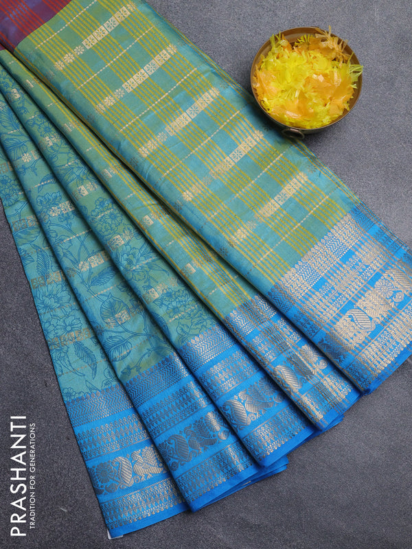 Semi raw silk saree dual shade of pastel maroon and teal bluish green with allover half & half style and zari woven border