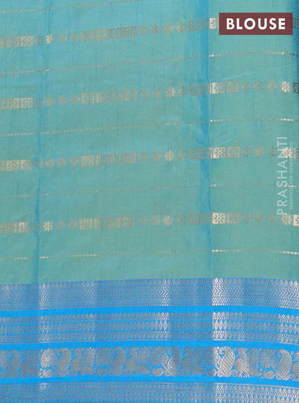 Semi raw silk saree dual shade of pastel maroon and teal bluish green with allover half & half style and zari woven border